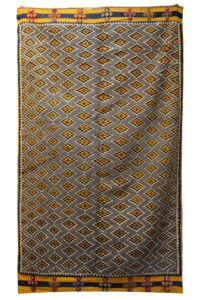 Taznakht Area Rug: High-Contrast Geometric Symmetry